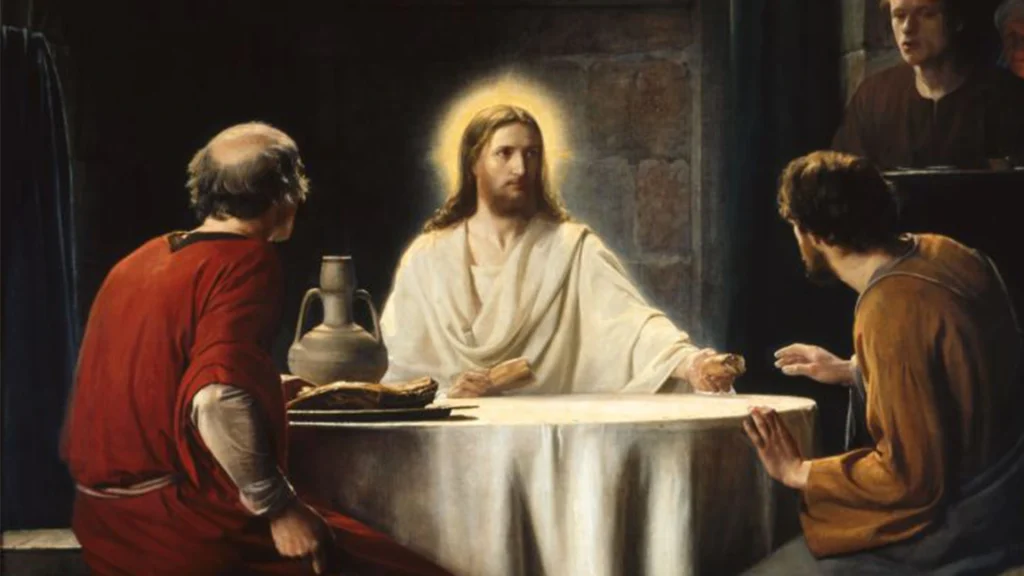 Khi đồng bàn với họ, Người cầm lấy bánh, dâng lời chúc tụng, và bẻ ra trao cho họ.  Mắt họ liền mở ra và họ nhận ra Người, nhưng Người lại biến mất. ...